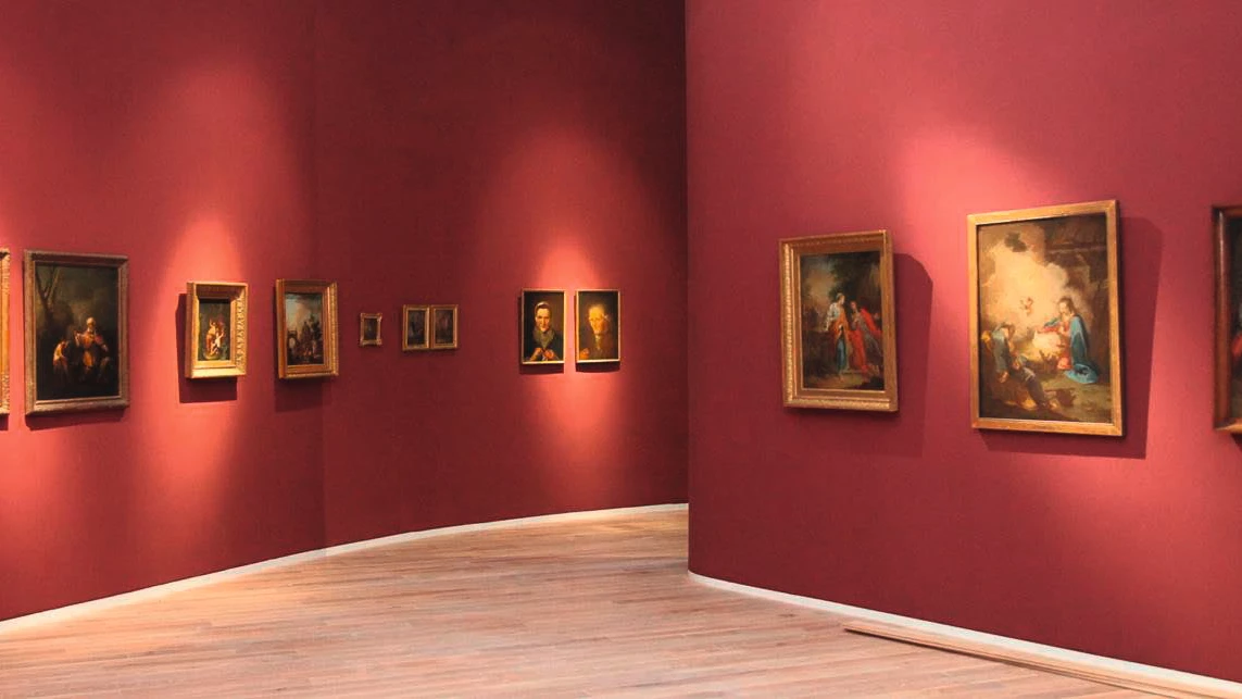 Gemälden an roten Wänden des Mittelrhein Museums
